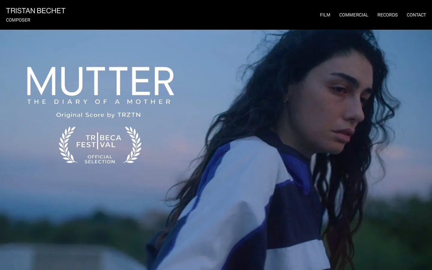 The new Tristan Bechet home page: a menu with Film, Commercial, Records and Contact over a video from the film Mutter